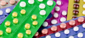 Colorful oral contraceptive pill.
