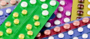 Artigos 9 Colorful oral contraceptive pill.